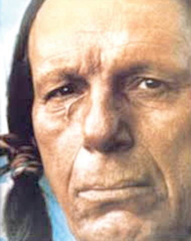 Close-up portrait of an older man with a serious expression and weathered facial features.