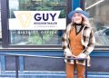 A woman stands outside Congressman Guy Reschenthaler’s district office in Pittsburgh.