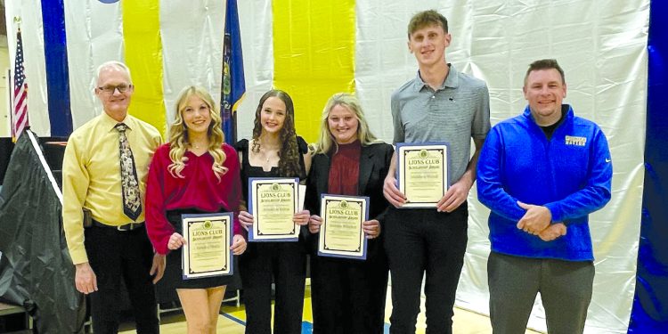 Student scholarship recipients and presenters pose with Lions Club scholarship certificates during an awards ceremony at West Greene High School.