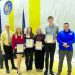 Student scholarship recipients and presenters pose with Lions Club scholarship certificates during an awards ceremony at West Greene High School.
