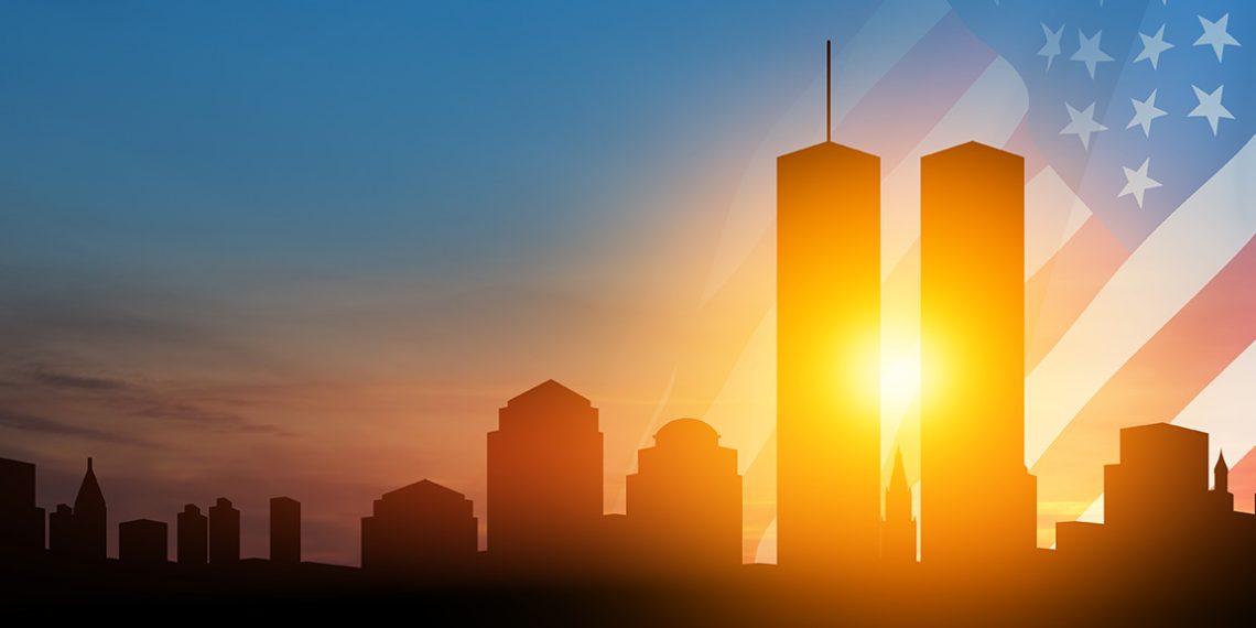 A stylized illustration of the Twin Towers rising above the New York City skyline with a faded American flag in the background at sunrise.