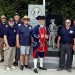 Members of the Fort Jackson Chapter of the Sons of the American Revolution gather at Greene County Veterans Memorial Park with a participant dressed in Colonial era attire.