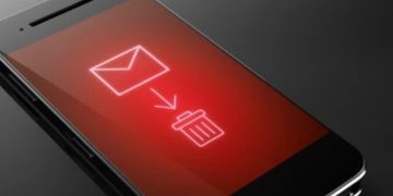 Angled smartphone with a glowing red screen showing an envelope icon, downward arrow, and trash bin symbol.