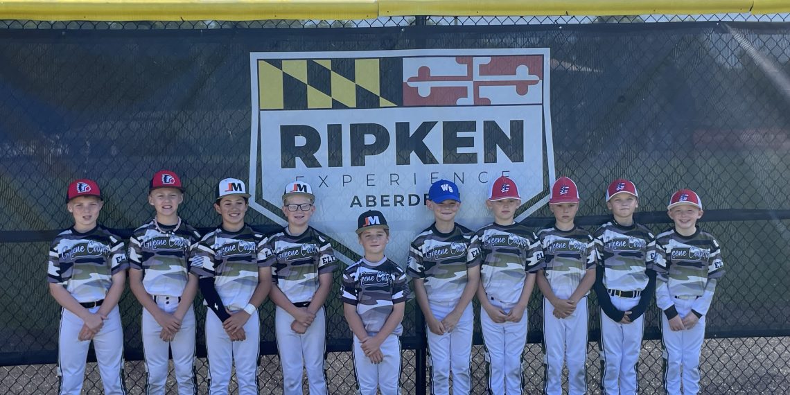 Greene County Elite youth baseball team poses in uniform at the Ripken Experience in Aberdeen, Maryland.
