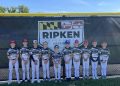 Greene County Elite youth baseball team poses in uniform at the Ripken Experience in Aberdeen, Maryland.